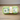 Plush dollar bill dog toy on white background