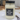 Hand-poured soy candle for dog moms on a cozy table