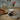Mug with a dog design on a table with pastries and jars in the background