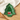 Green tree-shaped tray with Christmas tree and dogs design on a wooden surface.