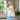 White canvas tote bag featuring an all-over print of different dog faces, measuring 16" x 17".