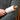 Reusable dog lint roller removing pet hair from a black sweater.