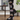 Black bamboo socks with all-over dog face pattern wearing glasses