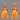 Dog-shaped earrings with orange and yellow patterns on a white background