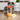 Dog playing with plush bacon toy from the Dog’s Breakfast set, mid-tug and tail wagging.