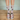 Light beige crew socks with beach-themed dog pattern