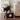 Dog playing with a chew toy in a living room