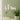 Three white dog-shaped hooks on a green wall with a key and paper attached, next to a potted plant.