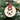 Wooden Christmas ornament with a paw print design on a tree.