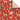 Christmas-themed wrapping paper with dogs and holiday elements on a red background.