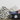 Collection of pet-related bags with animal and paw print patterns on a light background