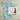 Blue dog-themed dish towel and potholder set with playful puppy pattern