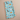 Flat lay of dog-themed towel on kitchen counter