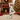 Beige sock with Christmas-themed design featuring Santa, reindeer, and trees on a white background.