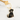 Close-up of Labrador keychain with black enamel and gold trim