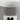 Close-up of a white mug with black stripes and a logo on a white background