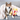 A dog playing with the popcorn bucket squeaky plush toy