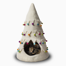 Load image into Gallery viewer, Feline curled up inside Christmas Tree Dog Bed, feeling cozy and festive